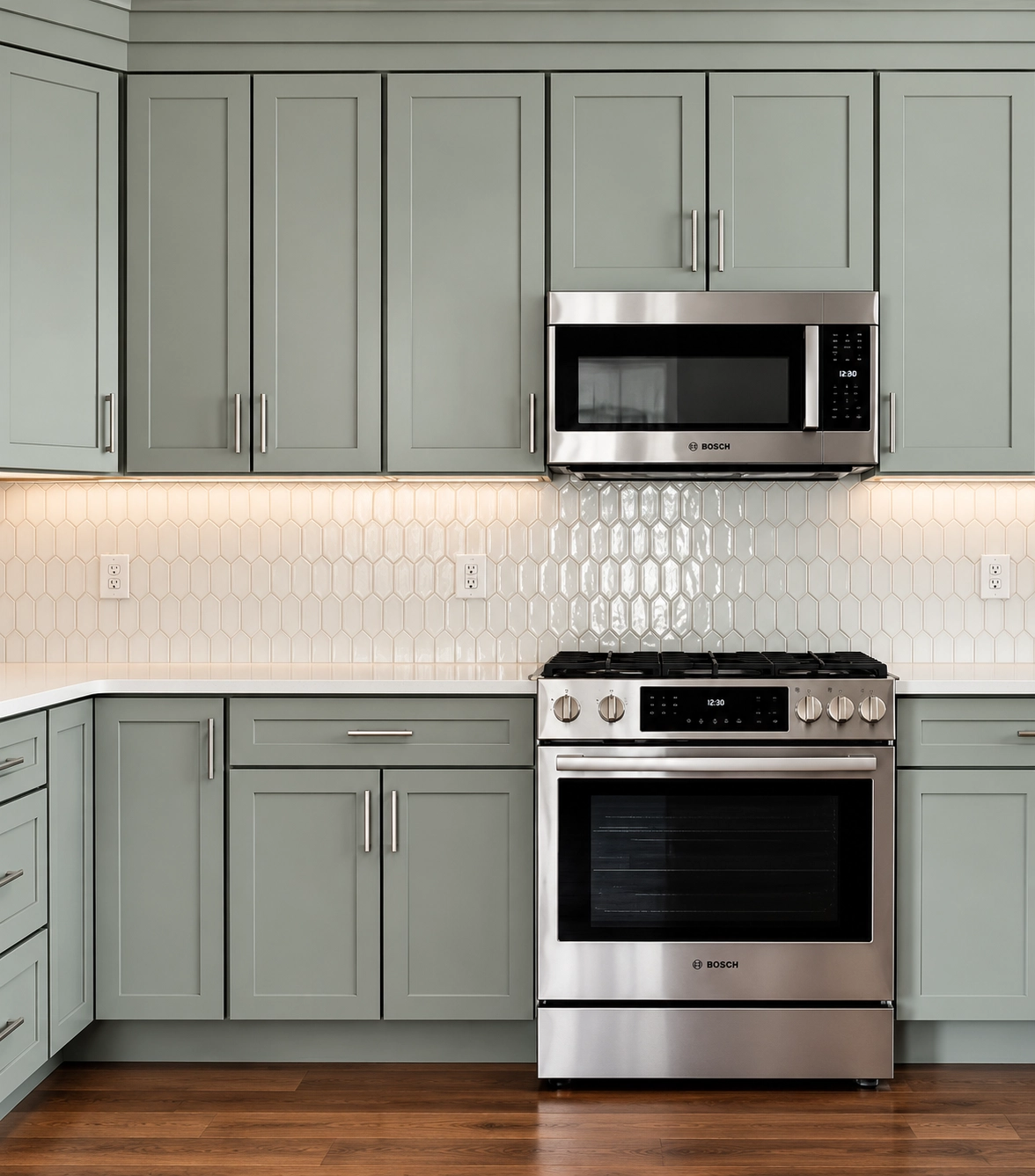 Gray shaker kitchen with white hexagon tile backsplash