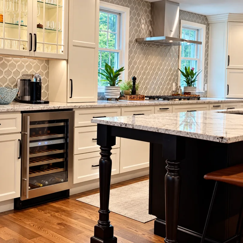 Black island with wine cooler and turned legs