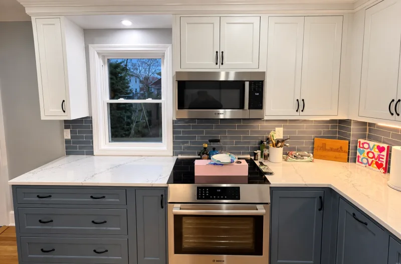 Slate blue base cabinets with white uppers