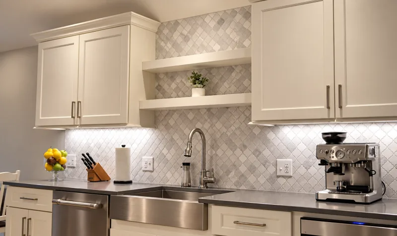 Arabesque marble backsplash and farmhouse sink